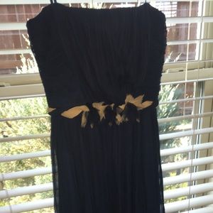 Black short party dress. Cute accent waist